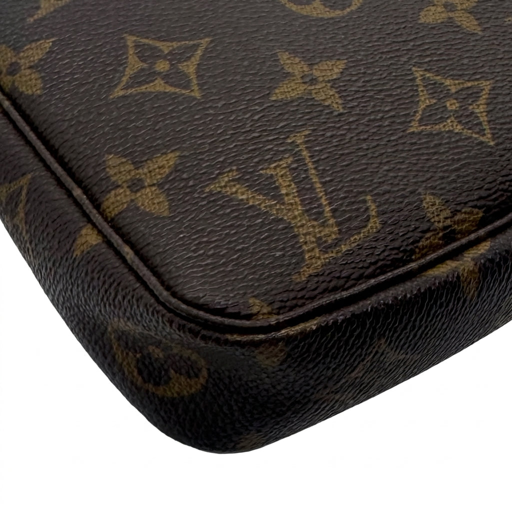 Pochette accessoires en cuir de vachette et toile Monogram enduite