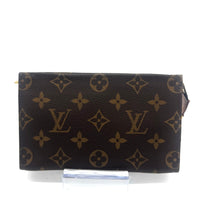 Pochette à maquillage PM en cuir de vachette et toile Monogram enduite