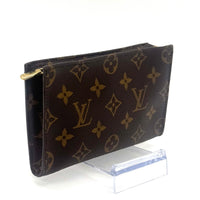 Pochette à maquillage PM en cuir de vachette et toile Monogram enduite