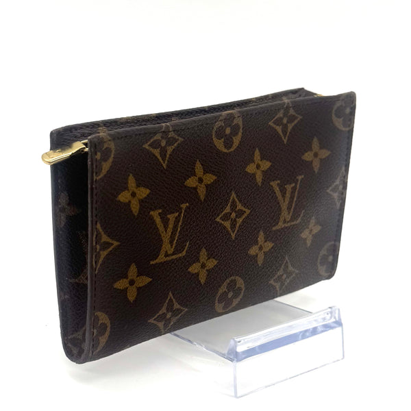 Pochette à maquillage PM en cuir de vachette et toile Monogram enduite