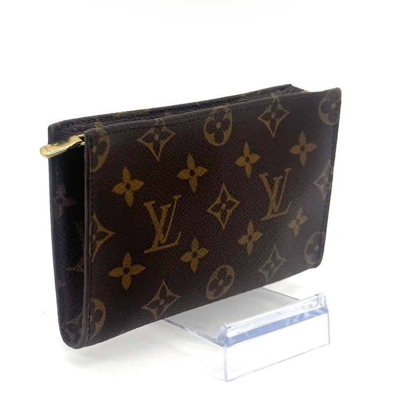 Pochette à maquillage PM en cuir de vachette et toile Monogram enduite