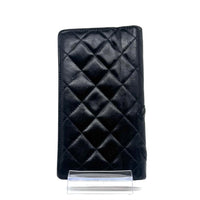 Portefeuille Cambon en cuir matelassé noir et cuir lisse rose