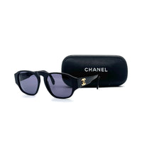 Lunette de soleil Coco mark CC en acétate noir et finitions dorées
