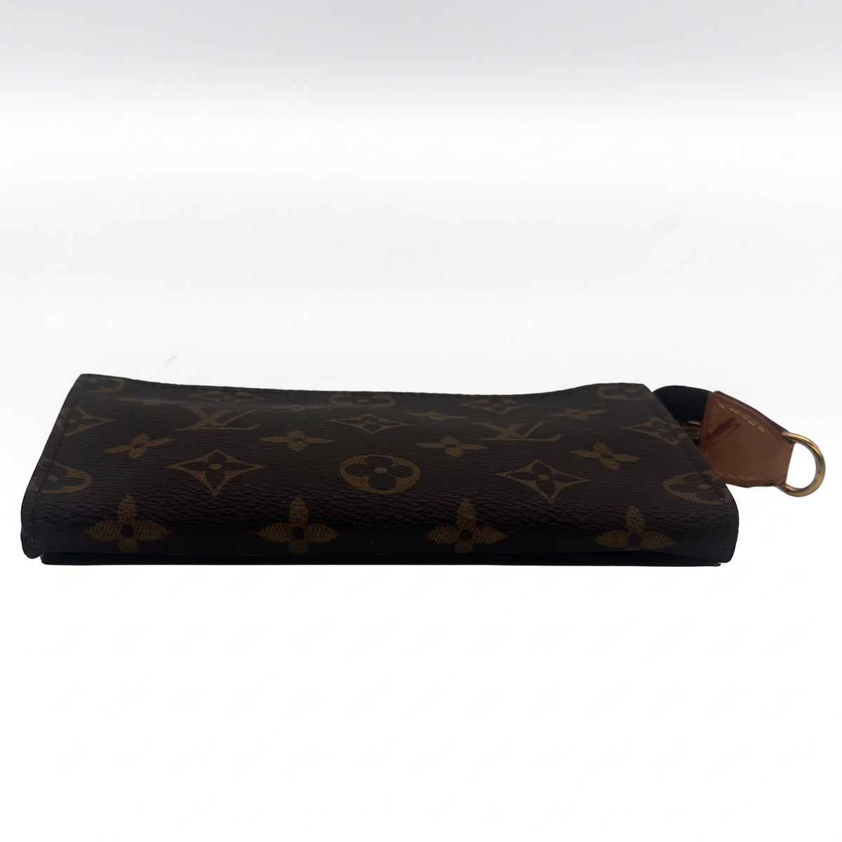 Pochette à maquillage PM en cuir de vachette et toile Monogram enduite