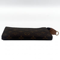 Pochette à maquillage PM en cuir de vachette et toile Monogram enduite