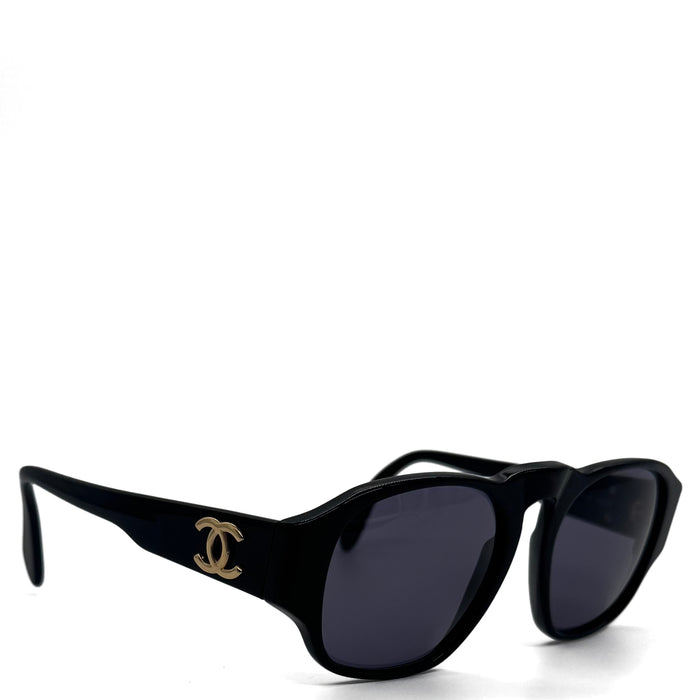 Lunette de soleil Coco mark CC en acétate noir et finitions dorées