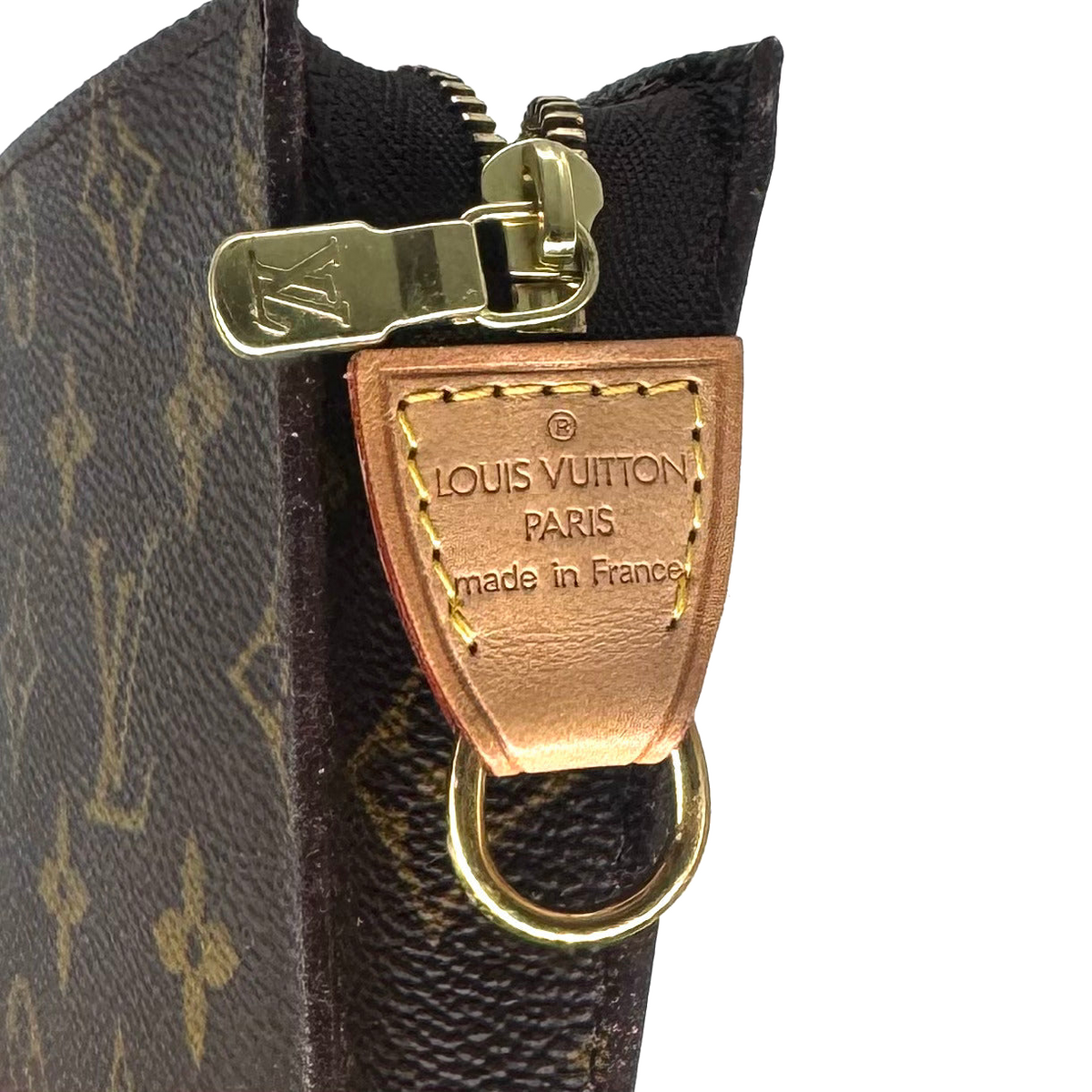 Pochette à maquillage PM, languette en cuir Louis Vuitton Paris made in France
