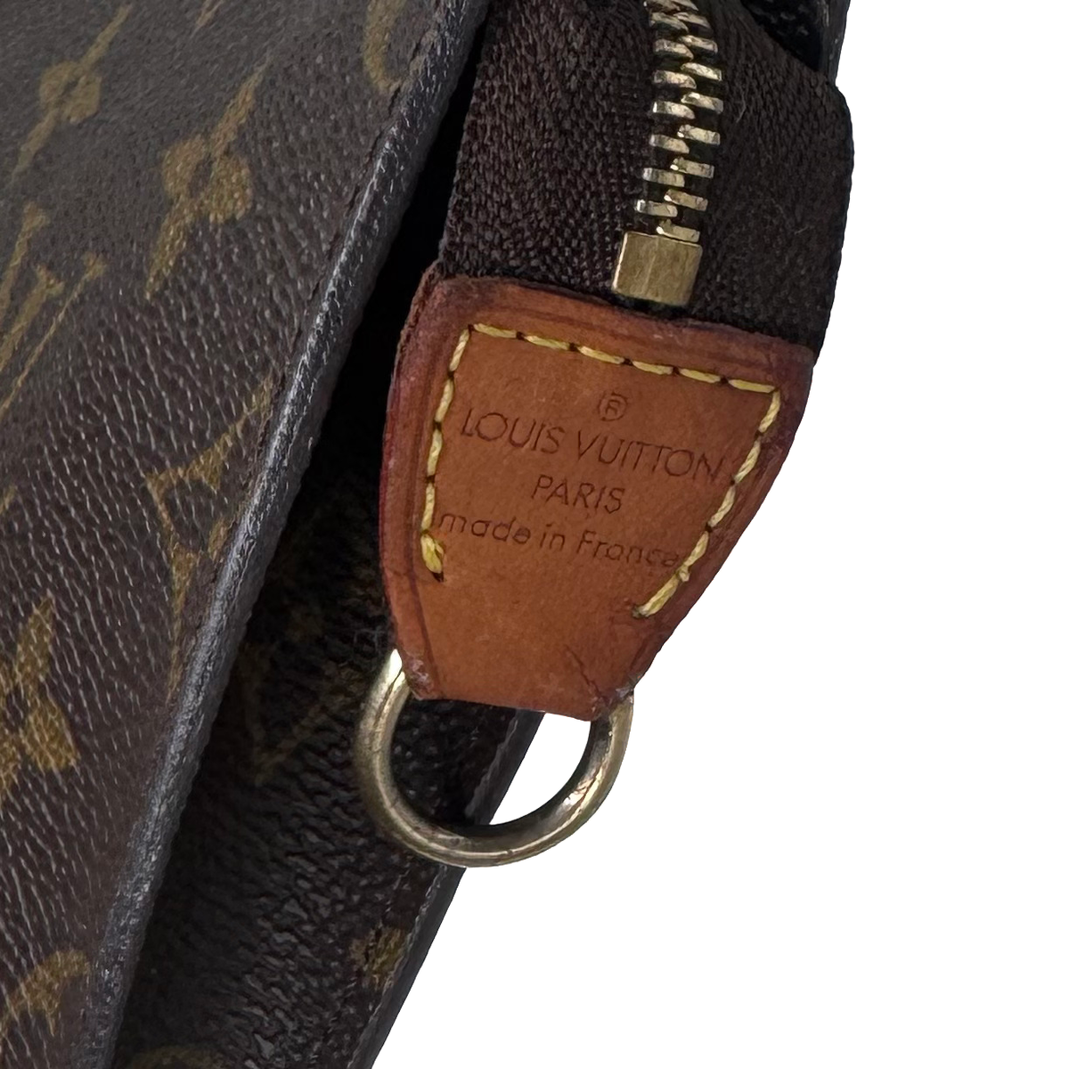 Pochette à maquillage PM, languette en cuir Louis Vuitton Paris made in France